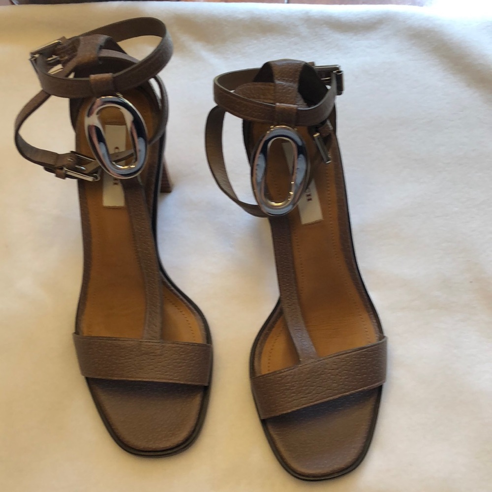 NWT Coach heels. Silver accents. Size 7.